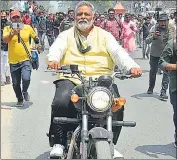  ?? HT PHOTO ?? Pappu Yadav during road show before filling nomination paper for Lok Sabha elections at Purnea on Thursday