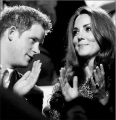  ?? — Photo by The Associated Press ?? Catherine, Duchess of Cambridge, and Britain’s Prince Harry watch the closing ceremony.