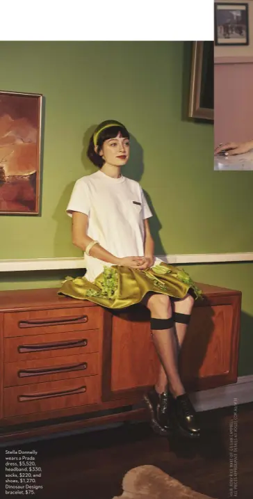  ??  ?? Stella Donnelly wears a Prada dress, $5,520, headband, $330, socks, $220, and shoes, $1,270. Dinosaur Designs bracelet, $75.