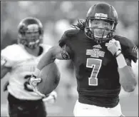  ?? Special to the Democrat-Gazette/JIMMY JONES ?? Arkansas State receiver Julian Jones (right) runs away from Idaho cornerback Delency Parham on an 80-yard touchdown pass from Adam Kennedy in the first quarter of Saturday night’s game.