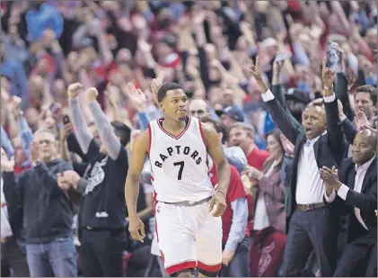  ?? Cp photo ?? The crowd reacts after Toronto Raptors guard Kyle Lowry (7) sunk a basket in the last seconds of second half NBA playoff basketball action against the Milwaukee Bucks, in Toronto on Tuesday. This week it wasn’t hard to find Raptors tickets available in...