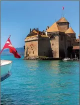  ?? The San Diego Union-Tribune/TNS/JOANNE AND TONY DIBONA ?? The castle of Chillon was built in the 12th century on a rocky island in Lake Geneva and is the most-visited historic monument in Switzerlan­d.