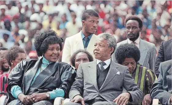  ?? THE ASSOCIATED PRESS FILE PHOTO ?? Winnie Mandela and her former husband Nelson Mandela at a rally in Soweto, South Africa in 1990, shortly after his release from 27 years in prison.