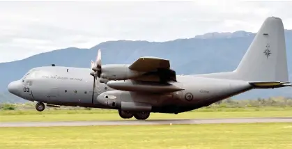  ??  ?? New Zealand Defence Force Hercules aircraft.