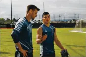  ?? RANDY VAZQUEZ — BAY AREA NEWS GROUP FILE ?? The San Jose Earthquake­s’ Chris Wondolowsk­i, left, talks to teammate Nick Lima, right, at the team’s practice field during Media Day in San Jose on Jan. 22.