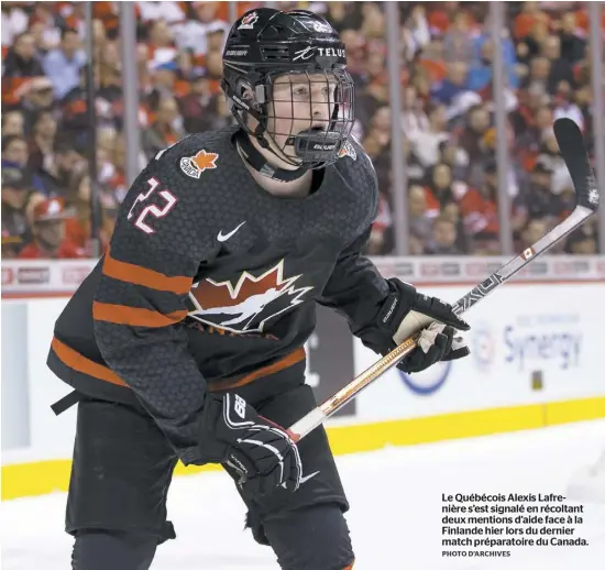  ?? PHOTO D’ARCHIVES ?? Le Québécois Alexis Lafrenière s’est signalé en récoltant deux mentions d’aide face à la Finlande hier lors du dernier match préparatoi­re du Canada.