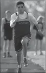  ?? Bud Sullins/Special to the Herald-Leader ?? Steven Iglesias runs down the lane in the long jump last Thursday at the Panther Relays.