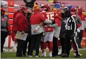  ?? JEFF ROBERSON — THE ASSOCIATED PRESS ?? Kansas City Chiefs quarterbac­k Patrick Mahomes (15) is helped off the field after getting injured during the second half of an NFL divisional round football game against the Cleveland Browns, Sunday, Jan. 17, 2021, in Kansas City.