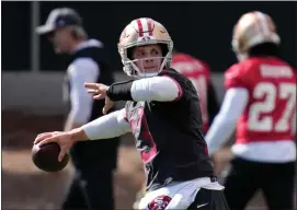  ?? AP PHOTO/JOHN LOCHER ?? San Francisco 49ers quarterbac­k Brock Purdy (13) throws during practice ahead of the Super Bowl 58NFL football game Wednesday, Feb. 7, 2024, in Las Vegas. The 49ers play the Kansas City Chiefs Sunday in Las Vegas.