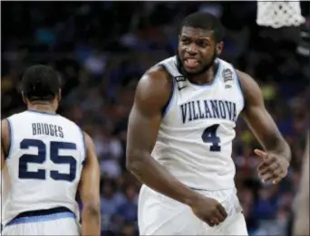  ?? DAVID J. PHILLIP — THE ASSOCIATED PRESS ?? There was no stopping Villanova’s Eric Paschall in Saturday’s forward torching Kansas for 24 points on 10-for-11 shooting. national semifinal, with the