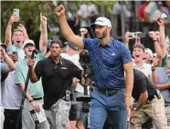  ?? Mary Schwalm/Associated Press ?? Dustin Johnson celebrates after sinking a putt to win the first playoff hole Sunday in Bolton, Mass.