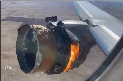  ?? (AP/Chad Schnell) ?? An engine on a United Airlines jet burns after takeoff Saturday from Denver Internatio­nal Airport. The Federal Aviation Administra­tion has ordered airlines to ground planes with certain Pratt & Whitney engines until they can be inspected.