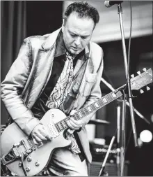  ?? Special to The Herald ?? Canadian blues guitarist David Gogo performs Saturday in Penticton.