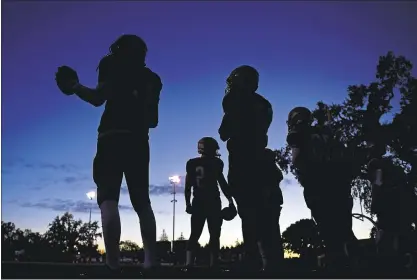  ?? JOSE CARLOS FAJARDO — STAFF PHOTOGRAPH­ER ?? Cardinal Newman players wait to take the field Nov. 4 against Rancho Cotate at Santa Rosa Junior College in Santa Rosa.