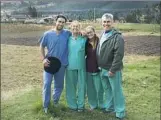  ??  ?? The Wilps family pauses for a photo with the mountains of Ecuador in the background. From left, Tyler, his mother, Lisa, sister, Claire and father, Jeffrey.