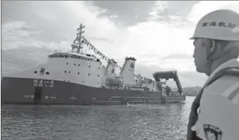  ?? JIN LIWANG / XINHUA ?? TanSuoYiHa­o, the mother ship of a 4,500-meter manned submersibl­e, returns to her home port of Sanya, Hainan province, on Friday after completing her maiden voyage.