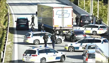  ??  ?? Police closes the Oresund bridge near Copenhagen. — Reuters photo