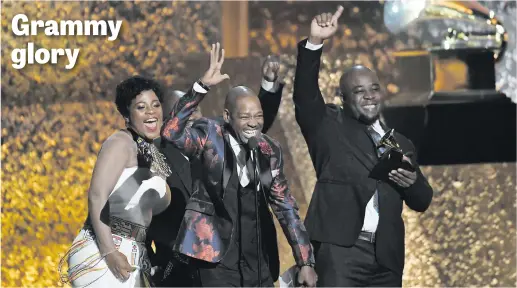  ?? Picture: Getty Images/AFP ?? Members of the Soweto Gospel Choir, winners of Best World Music Album for Freedom, accept their award on Sunday during the 61st annual Grammy Awards at Staples Centre in Los Angeles, Califonia.