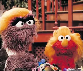  ??  ?? Muppet Donald Grump, left, appears in a 2005 episode of Sesame Street with worried apprentice Elmo in this image from a YouTube video. Elmo wins all his events, but is cast out by the Grouch Grump anyway.