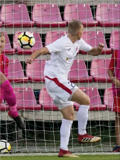  ?? Pictures: SNS ?? Craig Gordon cannot get near Vaidas Slavickas’s header as Suduva level the score