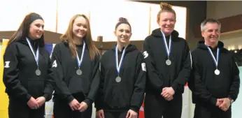  ?? HANDOUT PHOTO ?? Lead Jordan Henson, second Hannah Lindner, third Lorelei Guidos, skip Carly Connor and coach Doug Dalziel pose with the silver medals they won at the B.C. under-18 curling championsh­ip last weekend in Nanaimo.