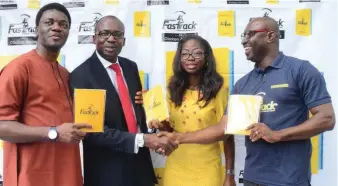  ??  ?? L-R: Reviewer of the book, ‘Management FasTrack’, Nathaniel Shofarasin, author, Oladapo Akinloye, wife of the author, Funke and Publisher, Samson Iyayi at the launch of the book