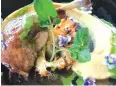  ?? ?? Confit duck with cauliflowe­r, paprika hummus and spinach oil and natural jus at Creation, the best vineyard in Africa.