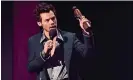  ?? Dave J. Hogan/Getty Images ?? Harry Styles accepting the award for artist of the year. Photograph: Dave J Hogan/