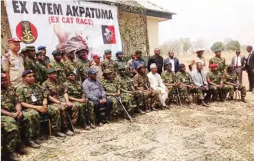  ??  ?? Chief of Army Staff, Lt. Gen. Buratai and other government dignitarie­s at the flag off of Operation Cat Race in a village in Guma LGA