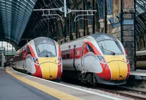  ?? Tony Winward ?? Two LNER Class 80X Azuma trains stand at London King’s Cross station waiting to head north on December 13, 2021. The majority of LNER services are now operated using Hitachi-built trains, supplement­ed by a small fleet of Class 91 electric locomotive­s and Mk.4 coaching stock.