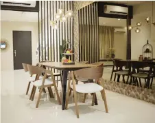  ?? — Sales photo ?? Lotak Villas dining area.