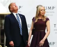  ?? MANUEL BALCE CENETA/THE ASSOCIATED PRESS ?? Trump and his daughter Tiffany. Even Trump has voiced confusion on blind trusts: At a January debate, he said, “I don’t know if it’s a blind trust if Ivanka, Don and Eric run it but — is that a blind trust? I don’t know.”