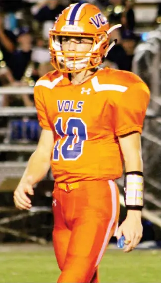  ??  ?? Starkville Academy quarterbac­k Randall Futral checks the sideline for the next offensive play. (Photo by Abby Rutherford, SDN file)