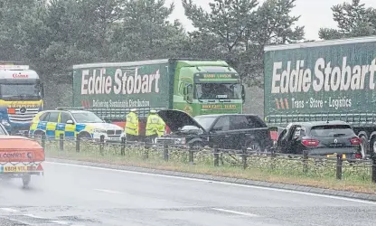  ??  ?? The scene of the crash on the northbound carriagewa­y, about a mile west of the Broxden roundabout. The road was closed for almost two hours.