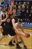  ?? AUSTIN HERTZOG - MNG ?? Phoenixvil­le’s Will Allain, right, looks around Boyertown’s Chris Kiefer, left, in a PAC playoff game Wednesday.