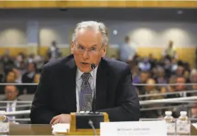  ?? Rich Pedroncell­i / Associated Press 2019 ?? PG&E CEO Bill Johnson speaks during an oversight hearing in Sacramento last year. He will step down from his job after just 14 months.