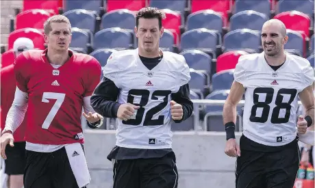  ?? ERROL MCGIHON FILES ?? Redblacks receivers coach Winston October figures QB Trevor Harris, left, has the best group to throw to in the CFL, including Greg Ellingson, centre, and Brad Sinopoli — along with Diontae Spencer and RJ Harris.