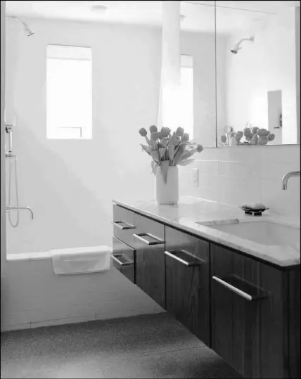  ?? METRO CREATIVE ?? Finding space to install an extra bathroom in a home can be a worthwhile investment.