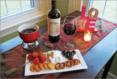  ?? PHOTO BY EMILY RYAN ?? For a twist on the trend, try drunken chocolate fondue from Penns Woods Winery.