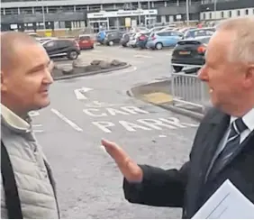  ??  ?? Alex Neil, right, is confronted by his ex-office manager Peter Owens