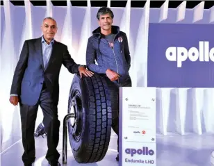  ??  ?? Apollo EnduMile LHD, the long haul drive tyre with superior mileage, unveiled by Milind Soman (r), winner of Ironman title and fitness enthusiast, along with Satish Sharma, President, Asia Pacific, Middle East & Africa, Apollo Tyres