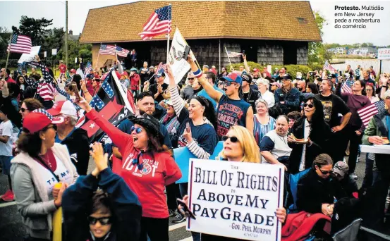  ?? EDUARDO MUNOZ/REUTERS ?? Protesto. Multidão em New Jersey pede a reabertura do comércio