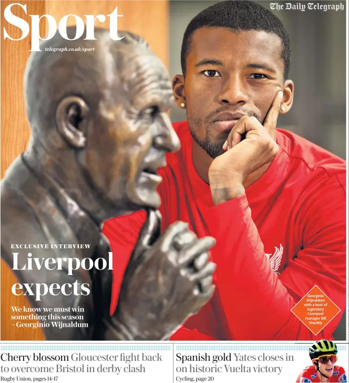  ??  ?? Georginio Wijnaldum with a bust of legendary Liverpool manager Bill Shankly