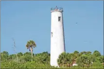  ?? CONTRIBUTE­D BY WESLEY K.H. TEO ?? The 1858 Egmont Key lighthouse at Egmont Key National Wildlife Refuge and State Park.