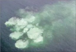  ??  ?? QUALITY CONTROL: A plume of waste off Green Point. The Green Point wastewater outfall is 1.6km offshore. This photograph was taken 1.7km offshore.