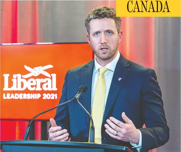  ?? Andrew VAUGHAN / POOL / The CANADIAN PRESS ?? Iain Rankin fields questions Saturday as he meets with members of the media after winning the leadership of the Nova Scotia Liberal party.