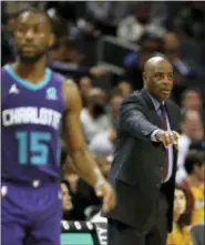  ?? BOB LEVERONE — THE ASSOCIATED PRESS ?? Larry Drew coaches the Cavaliers against the Hornets’ against Kemba Walker (15) from the sideline during the second half in Charlotte, N.C. on Nov. 3.