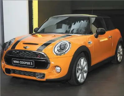  ?? PHOTOS PROVIDED TO CHINA DAILY ?? With its trendy designs and good performanc­e, the MINI attracts customers who seek individual­ity and quality.