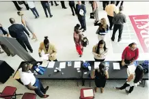  ?? LYNNE SLADKY/THE ASSOCIATED PRESS ?? A job fair in Florida. A private survey shows that American businesses added 213,000 workers in June, a sign of health and resilience for the U.S. labour market and economy.