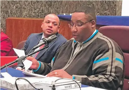  ??  ?? City Treasurer Kurt Summers ( left) and Ald. Jason Ervin ( 28th), vice chairman of the City Council’s Budget Committee, before the start of Thursday’s budget hearing at City Hall.
| FRAN SPIELMAN/ SUN- TIMES